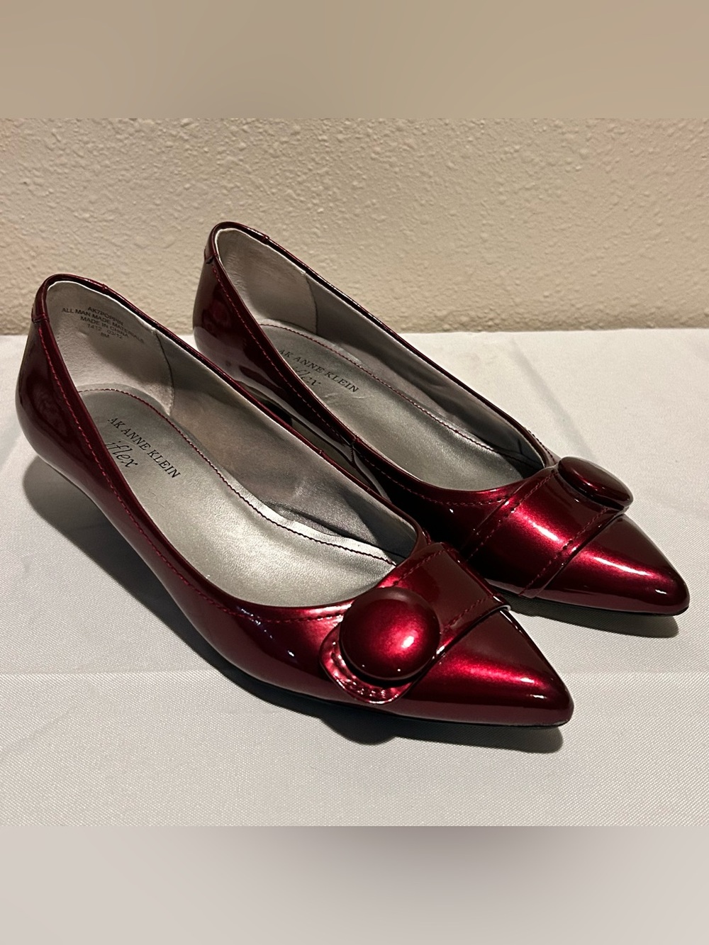 Anne Klein Metallic Burgundy Pointed-Toe Flats with Button Accent